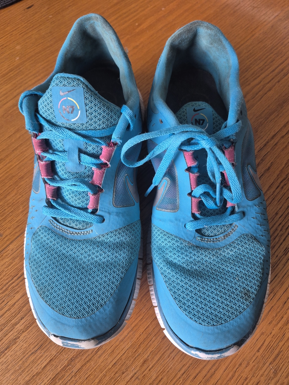 Nike Women’s Turquoise Running Shoes with Pink Accents